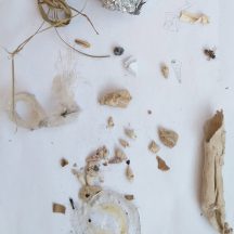 At my studio, on the table, I create for myself a small empire of neglected material around me, to question my existence as a human through them! Image taken with my mobile phone camera, 2020.