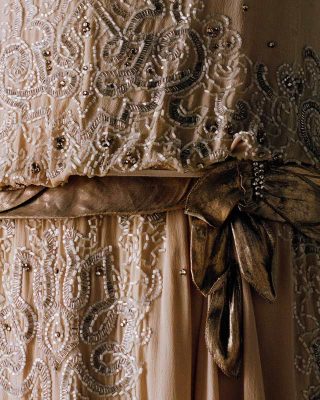 Gabrielle Chanel (designer), Evening dress c. 1923–26 (detail). Silk crêpe, tube and rhinestone, embroidery, lamé, tulle embroidered with gold thread. Patrimoine de CHANEL, Paris. Photo © Julien T. Hamon